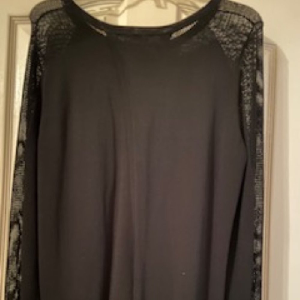 Dexter Size Large.  Black lightweight sweater with open back and netted sleeves.